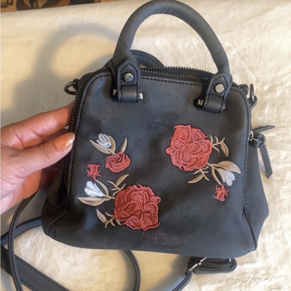 Small black purse with roses